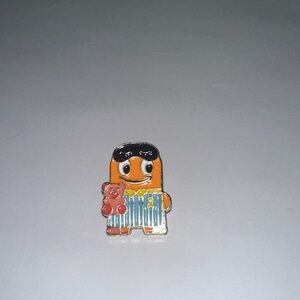 Amazon Orange and Blue Enamel Character Brooch with Pink Bear